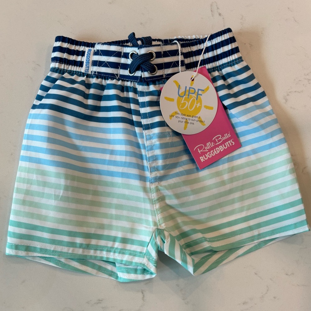 NWT Rugged Butts swim trunks 6-12 months